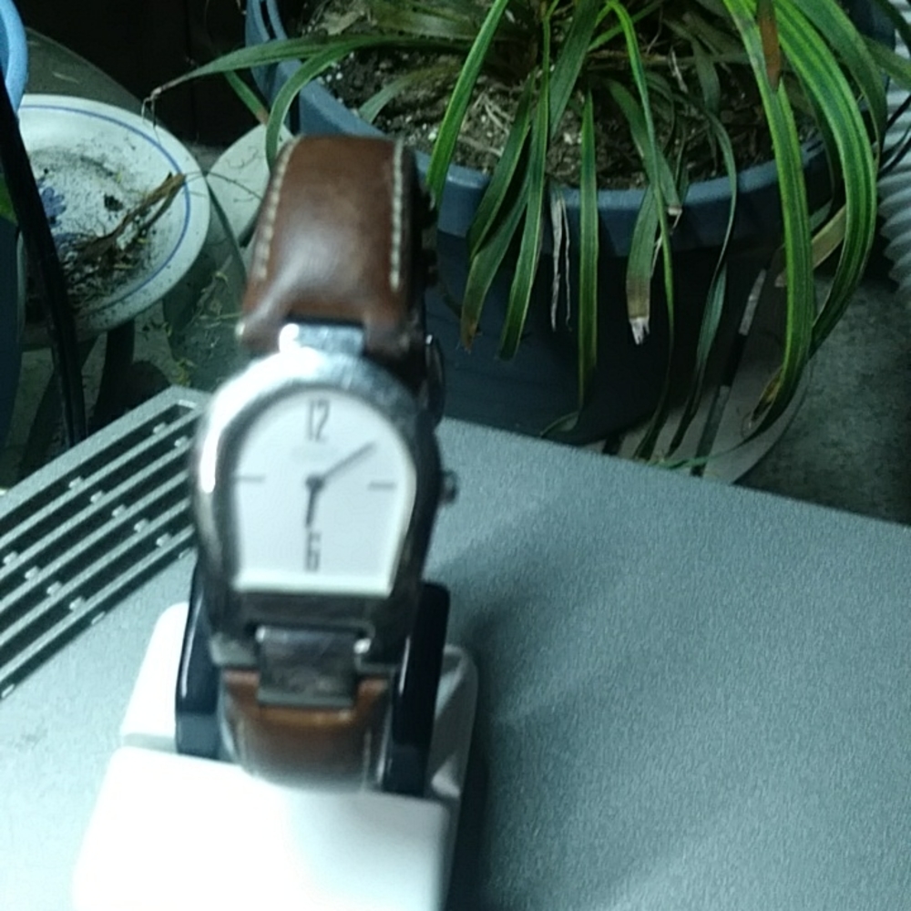 Coach silver watch with brown leather band